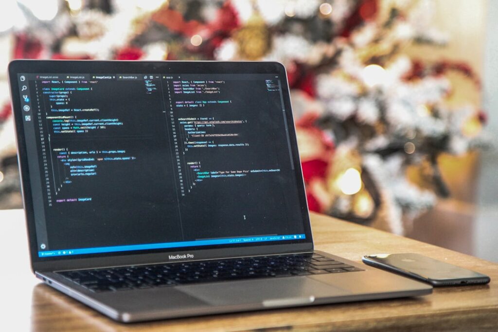 YouTube Data API 채널 인기 영상 자동 수집 - MacBook Pro on brown wooden surface