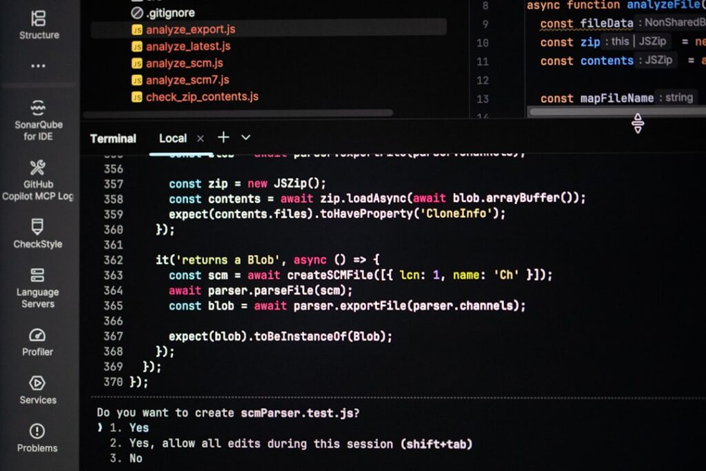 Claude API 가격 - Coding on a dark theme computer screen